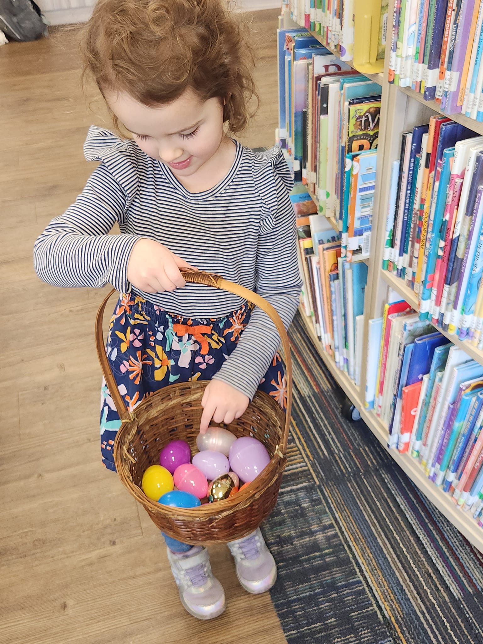 girl finding easter eggs