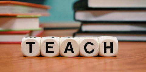 "teach" spelled in blocks