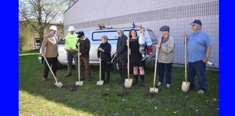 people holding shovels